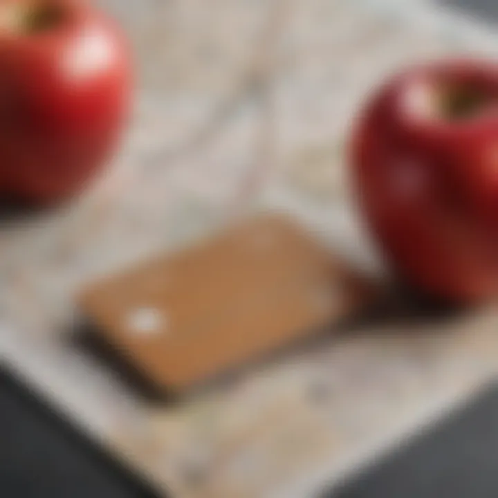 A close-up of the Apple Card against a map and travel essentials