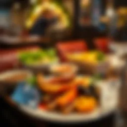 Delicious restaurant meal on a table with cash back credit card visible